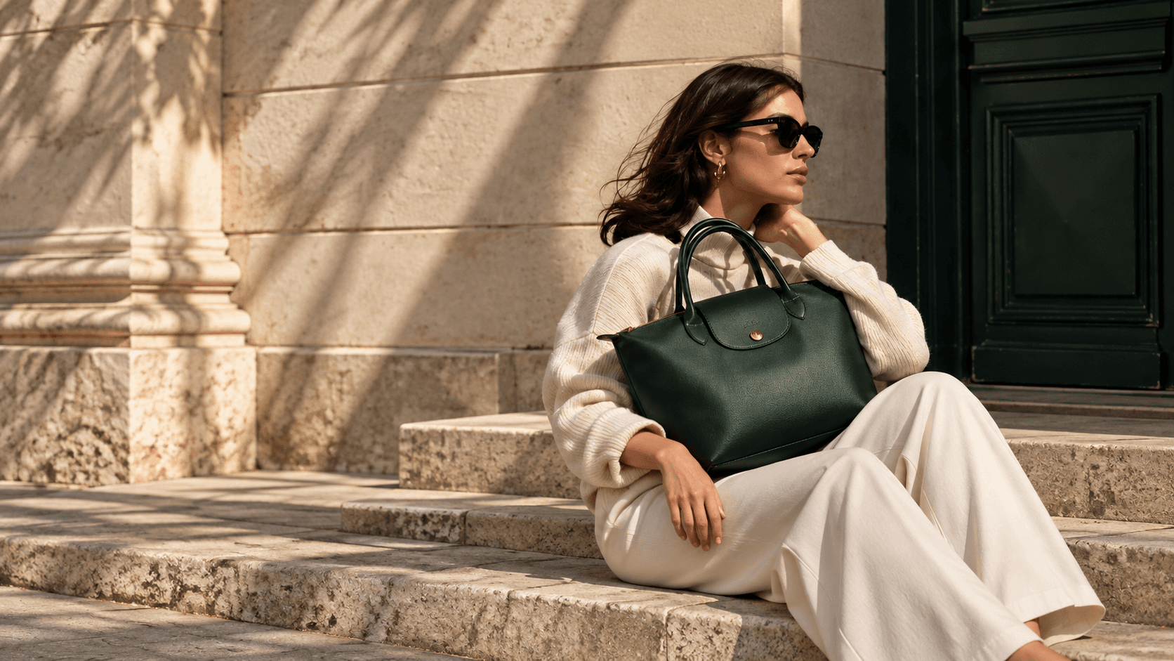 Longchamp deep green bag in an architectural setting